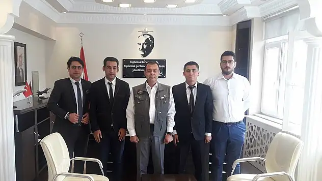 HACILAR ÜLKÜ OCAKLARI'NDAN KAYMAKAM SEZEN'E ZİYARET