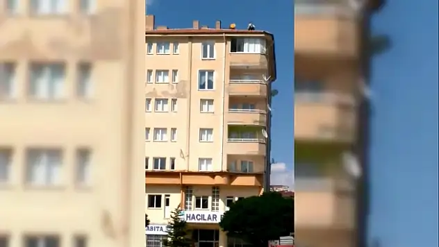 Hacılar'da eşiyle tartışan şahıs belediye binasının çatısına çıktı