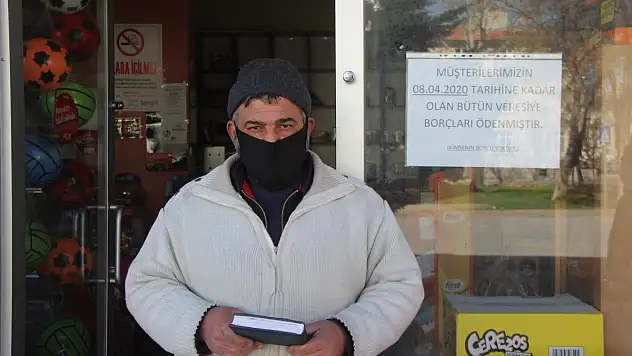 KAYSERİ'DE BİR HAYIRSEVER VERESİYE DEFTERİNİ SATIN ALDI