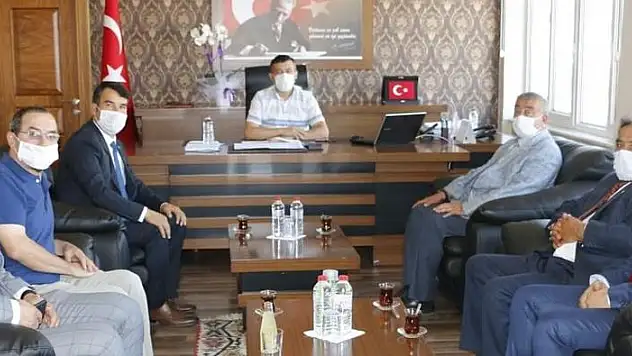MHP'Lİ İLÇE BAŞKANI SÜMER'DEN KAYMAKAM BAYRAM'A ZİYARET