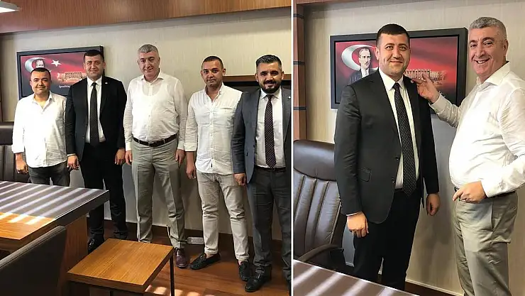 ERSOY'UN ROZETİNİ SERKAN TOK TAKTI