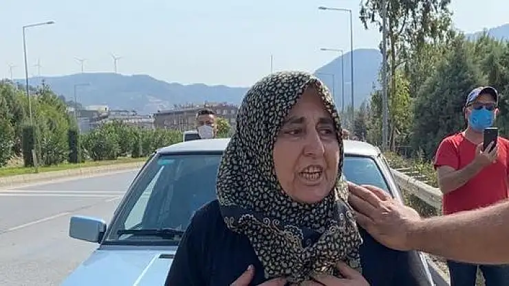 EVİ YANAN KADIN FERYAT ETTİ