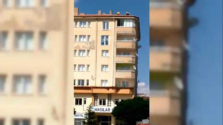 Hacılar'da eşiyle tartışan şahıs belediye binasının çatısına çıktı