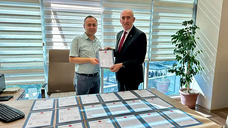 KESOB'un konut projesinde arsaların tapuları alındı